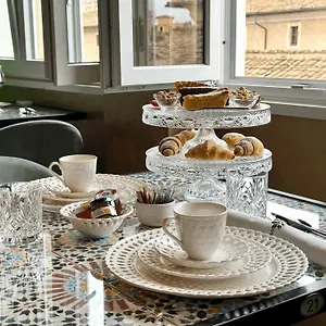 Otel Caravita, Roma